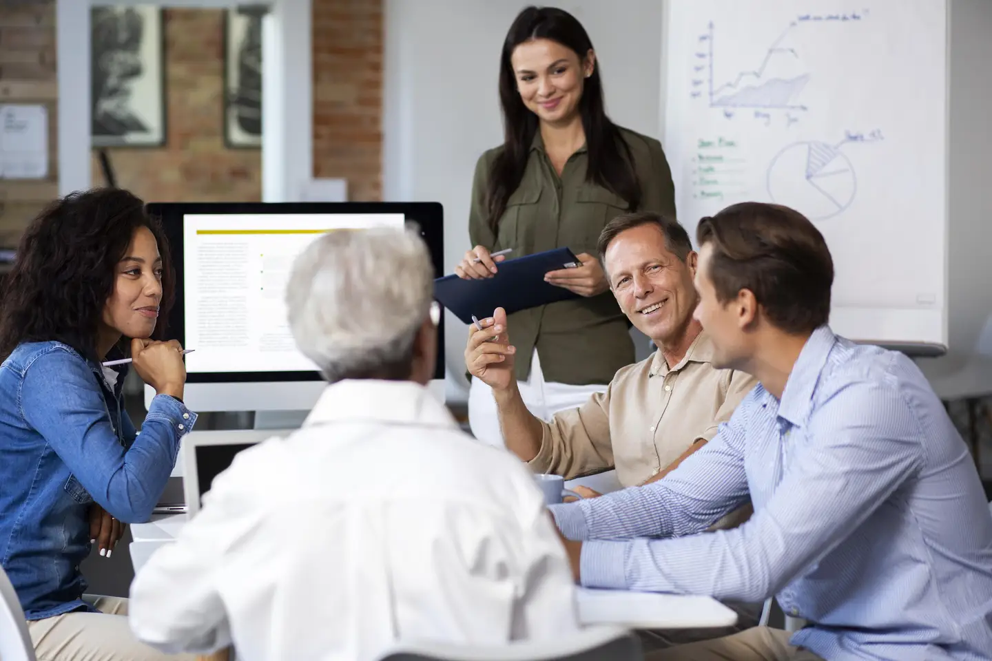 People Using Digital Device While Meeting